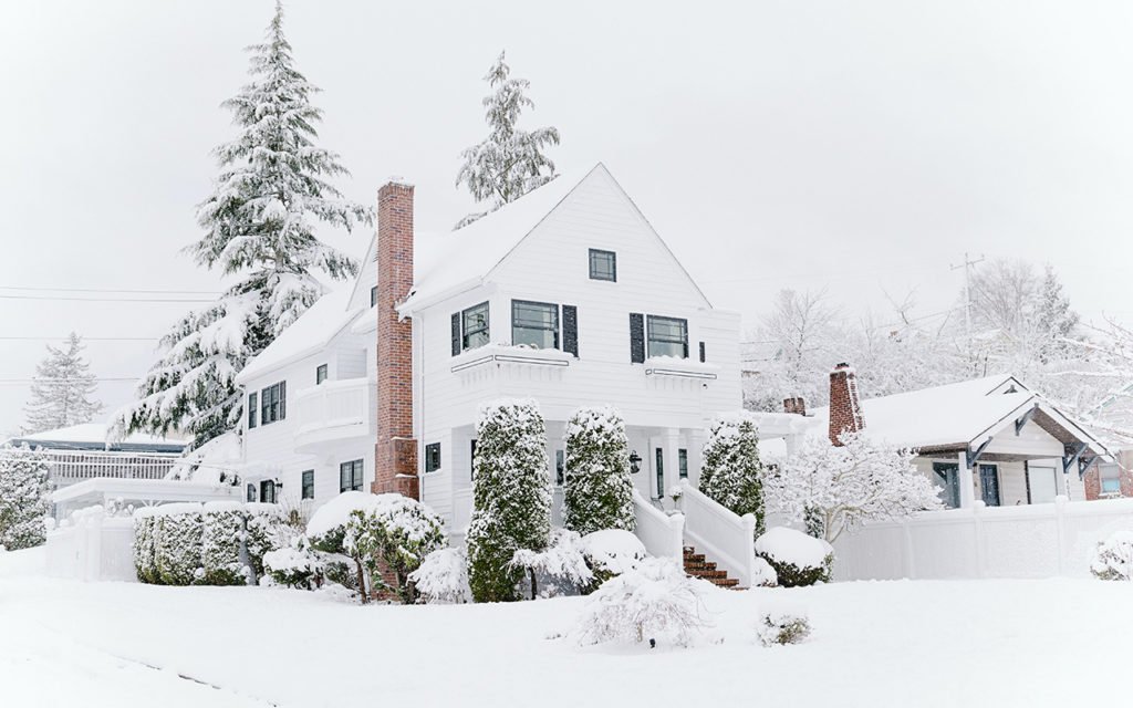 2-story home in the snow